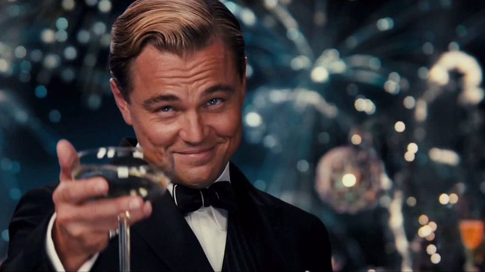 Leonardo Decaprio in Gatsby Cheersing a Glass of Champagne